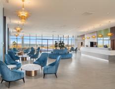 Sirius Hotel ****s Lobby mit türkisen Stühlen im Hotel Sirius